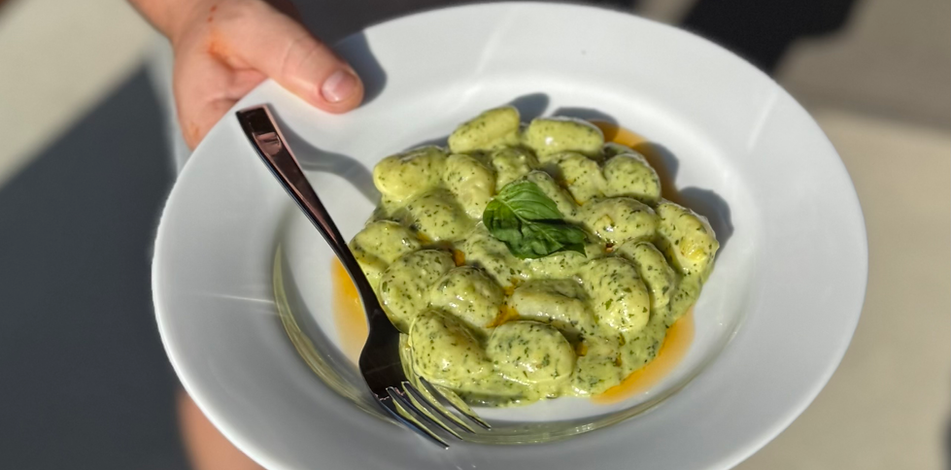 Potato gnocchi with vibrant basil pesto