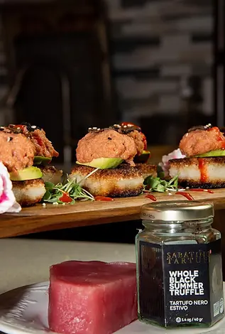 Crispy rice sushi bites with spicy tuna and summer truffle