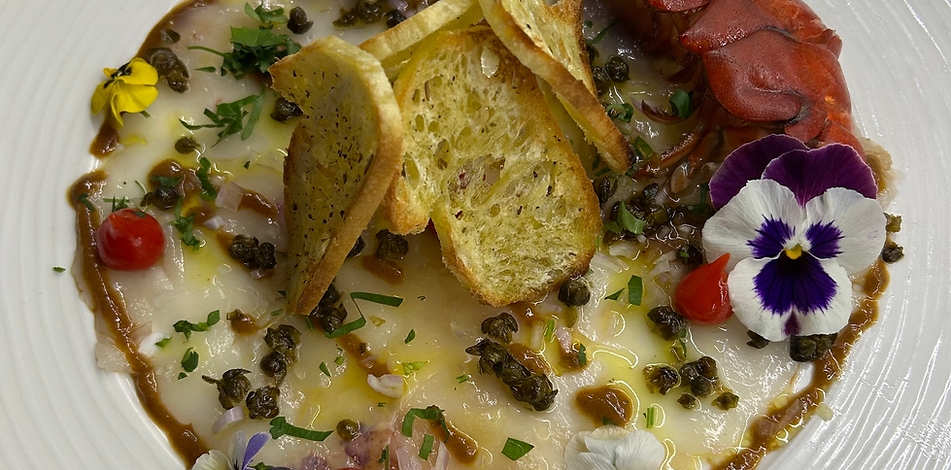 Lobster carpaccio with capers and edible flowers