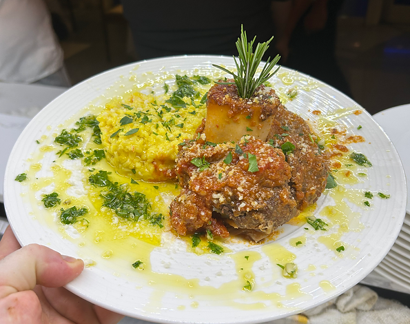 Braised short rib with saffron risotto and gremolata