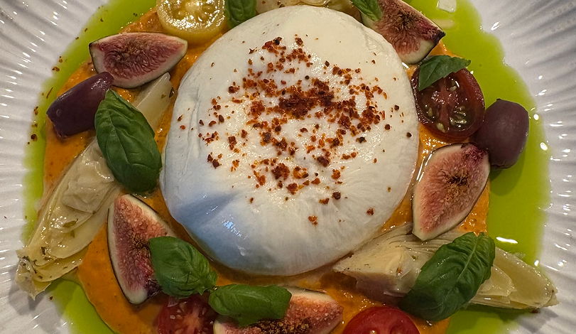 Burrata with fresh figs, artichoke hearts and herbs